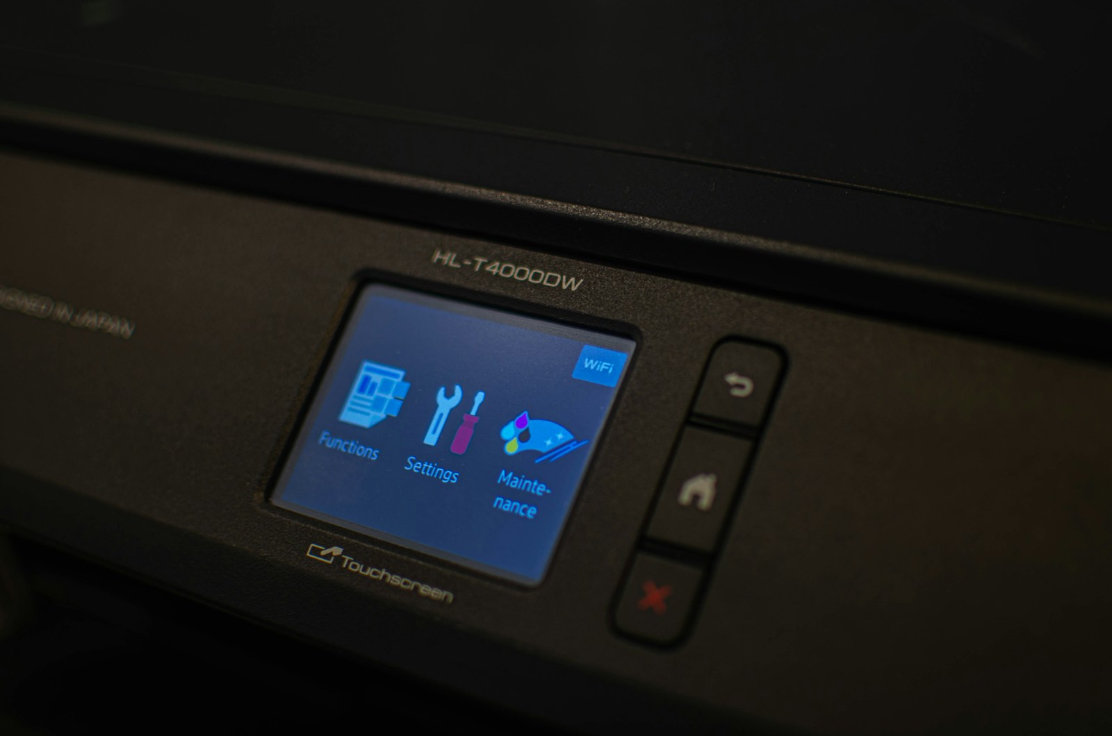 Close-up of a printer control panel showing its status readout