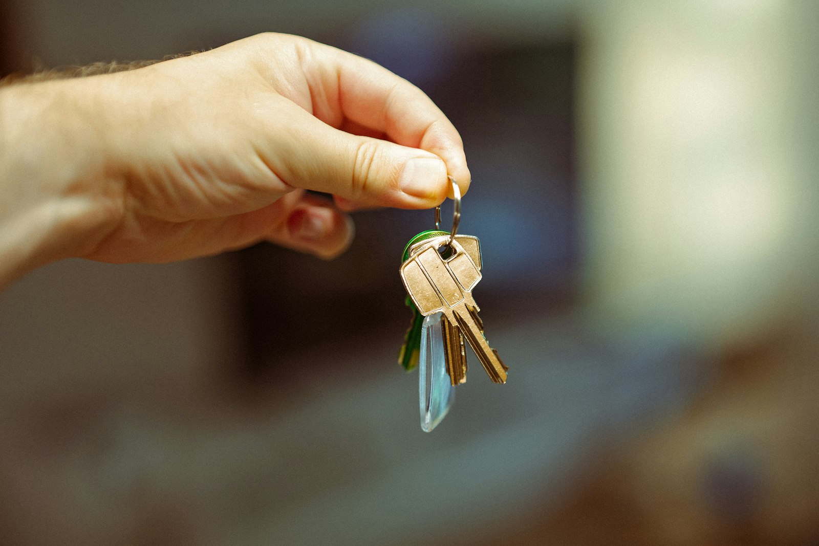 A hand holding a set of keys — your context and credentials on hardware you control